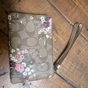 Beautiful like new Coach floral wristlet pink/brown/cream